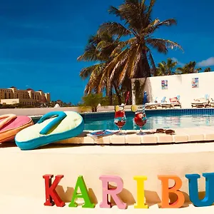 Karibu Aruba Boutique Палм Бич